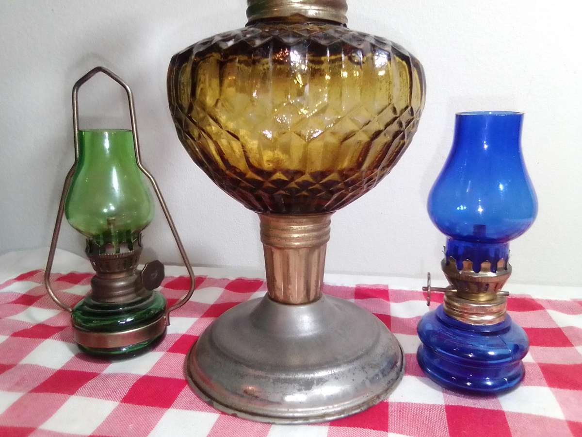 These are very small/mini Amber and green\blue decorative paraffin/kerosene oil lamps.