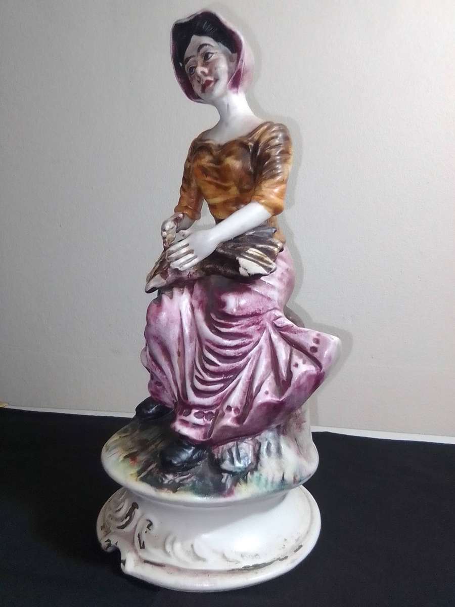 An elegant figurine from master Italian sculptor, A Farm Lady. Capodimonte made in Italy 285mm Tall