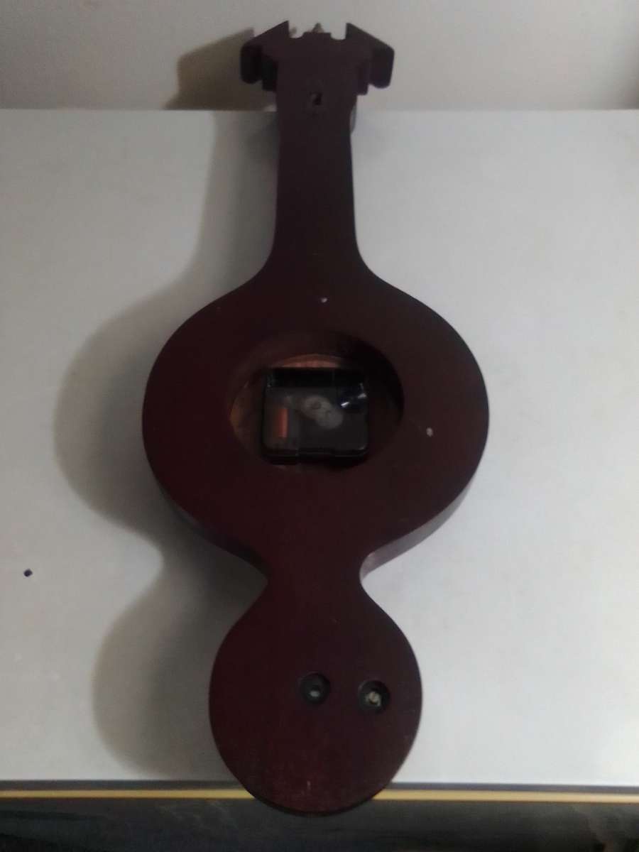 Vintage Banjo Barometer/Thermometer and a working Quarts clock.
