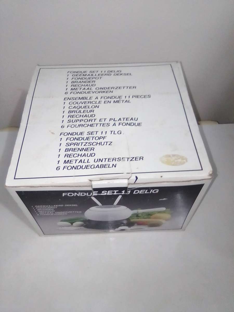 Wow a Elweco boxed complete White enamel Fondue set in almost new condition.