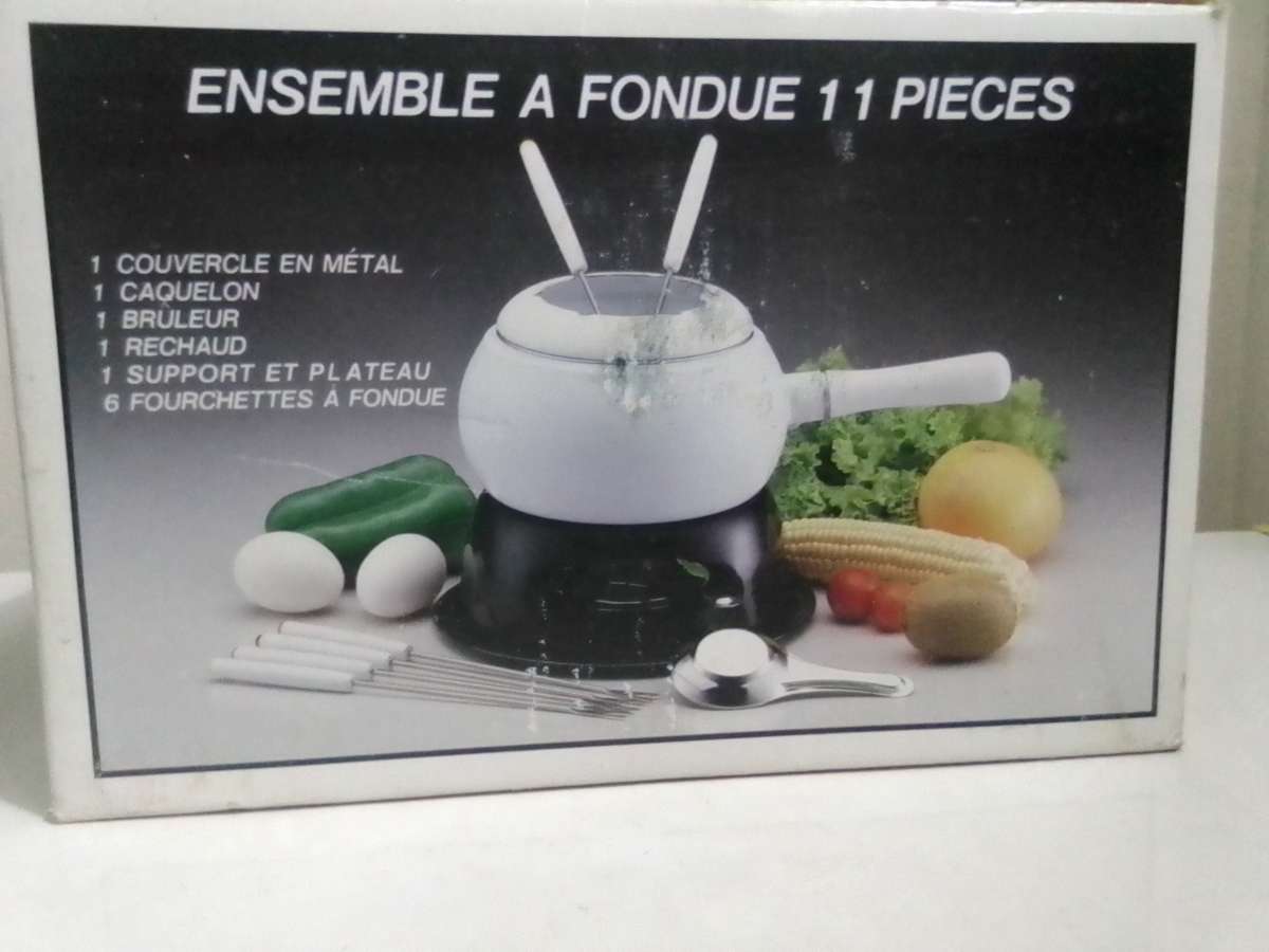Wow a Elweco boxed complete White enamel Fondue set in almost new condition.