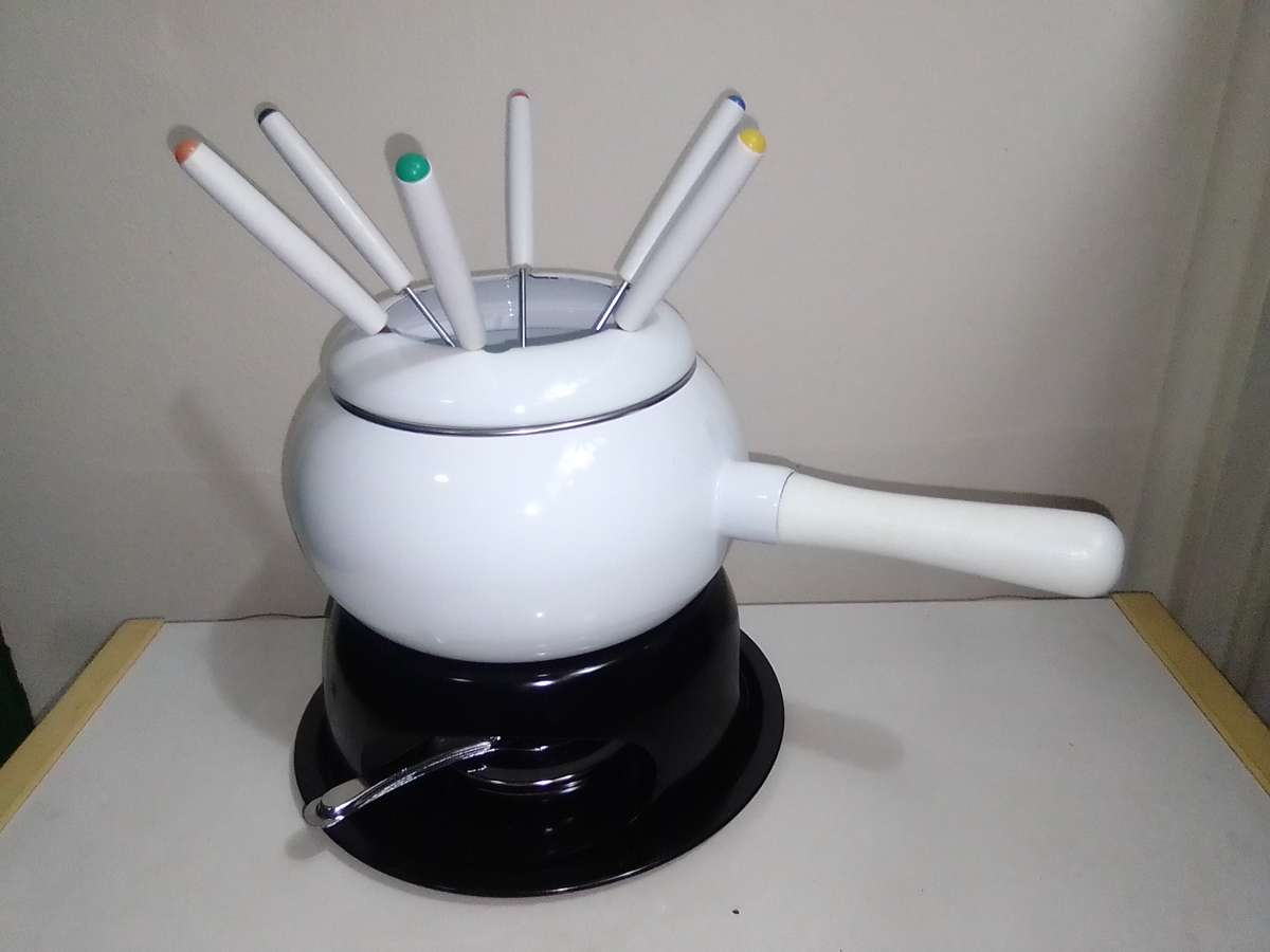 Wow a Elweco boxed complete White enamel Fondue set in almost new condition.