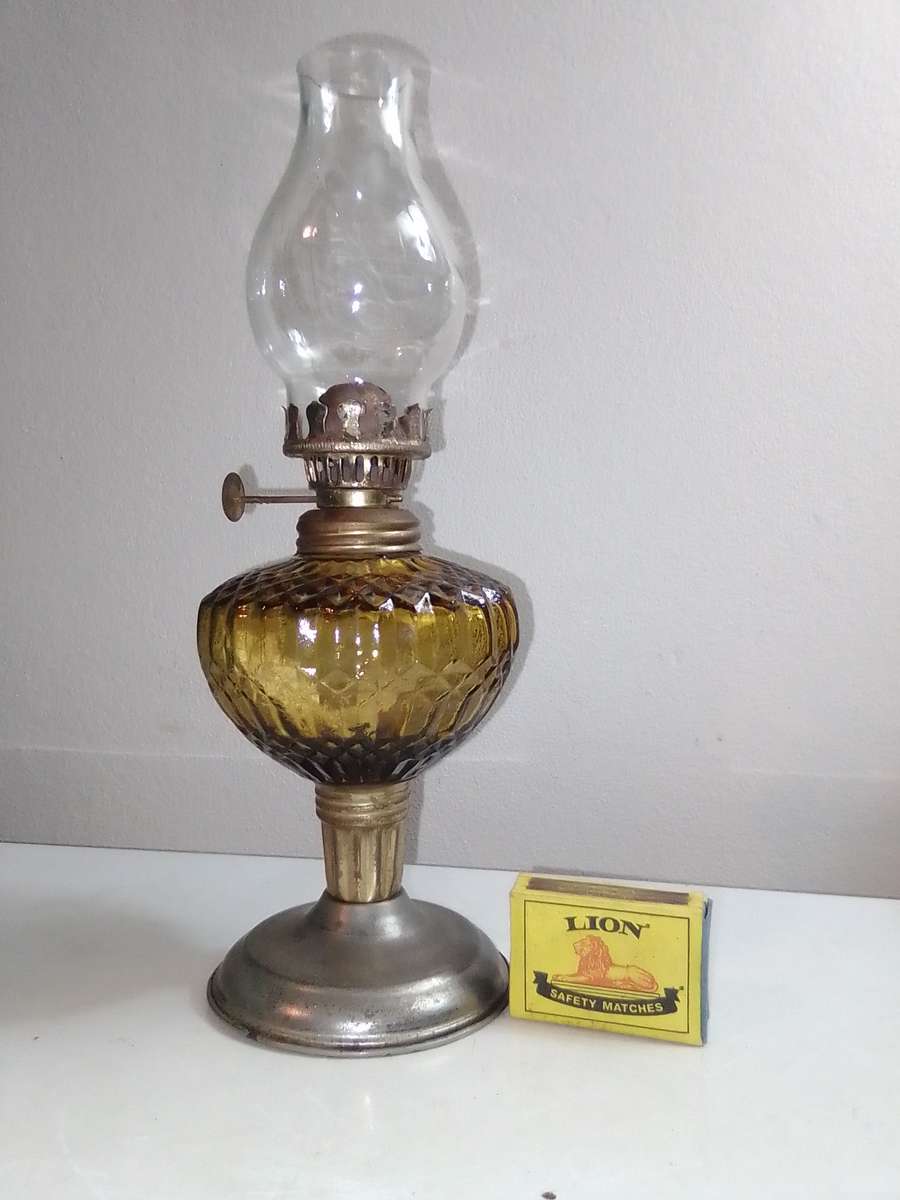 These are very small/mini Amber and green\blue decorative paraffin/kerosene oil lamps.