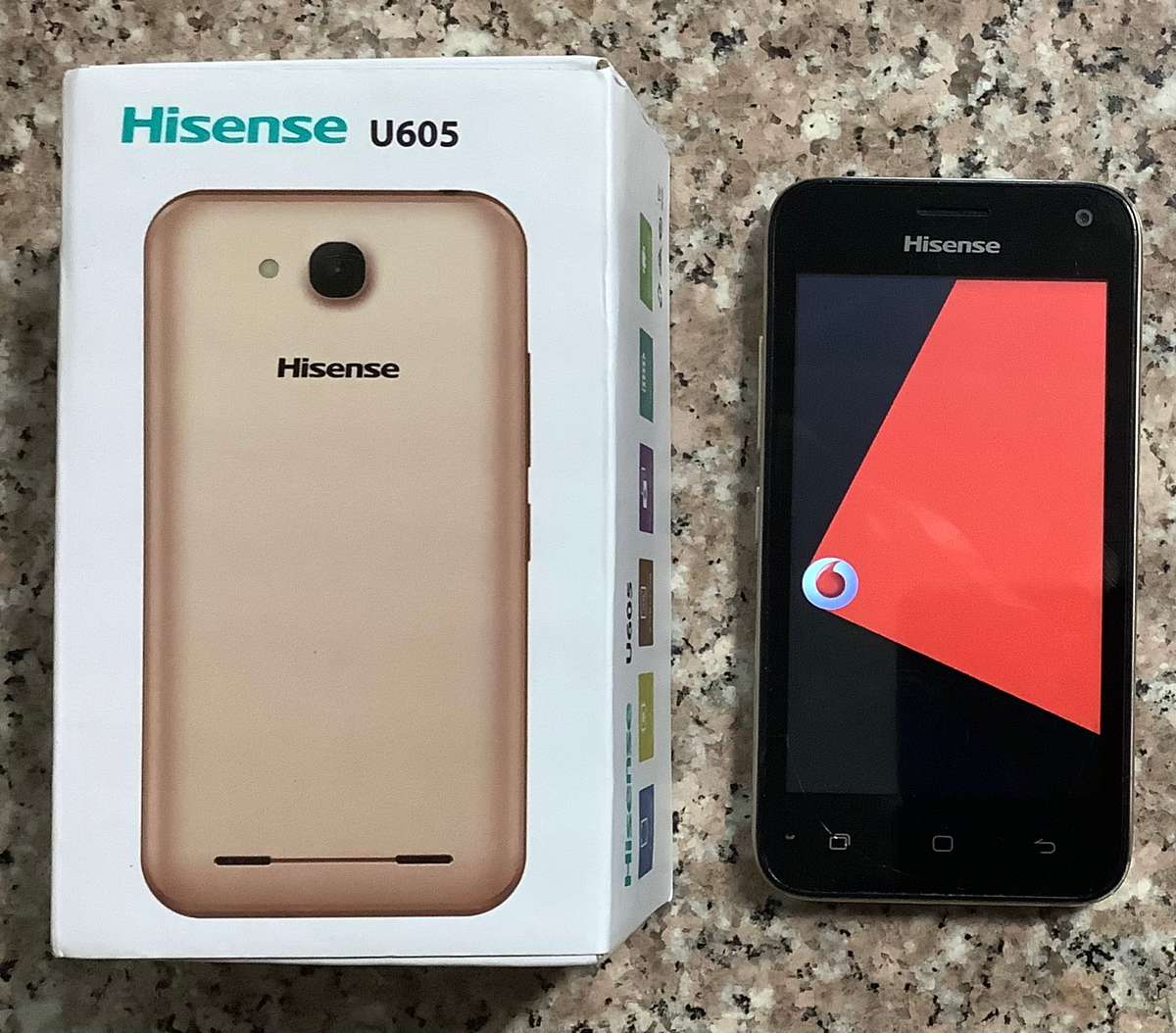 HISENSE U605 8GB VODACOM LOCKED GOLD.