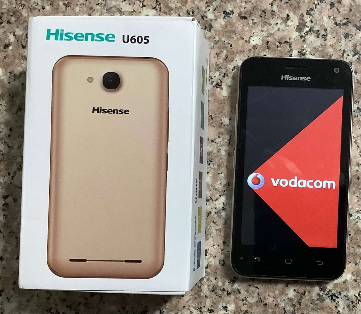 HISENSE U605 8GB VODACOM LOCKED GOLD.