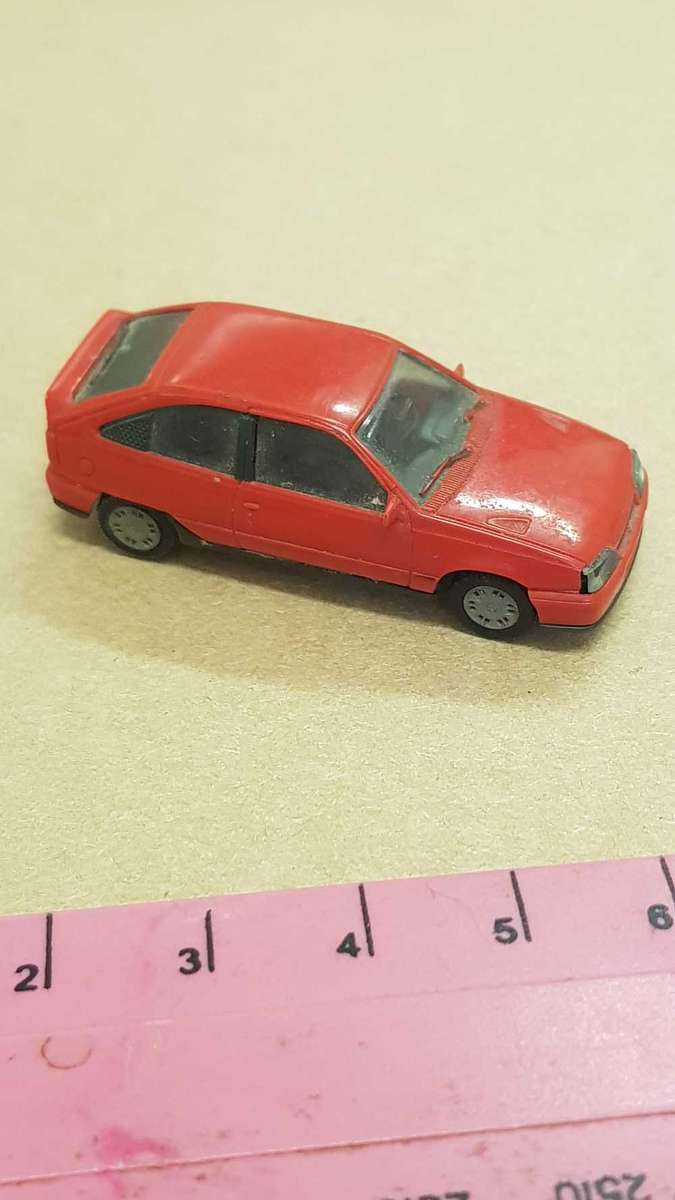 Small model replica of 1986 Opel Kadett Gsi. 45mm as reference.  Made in Germany.  Plastic.