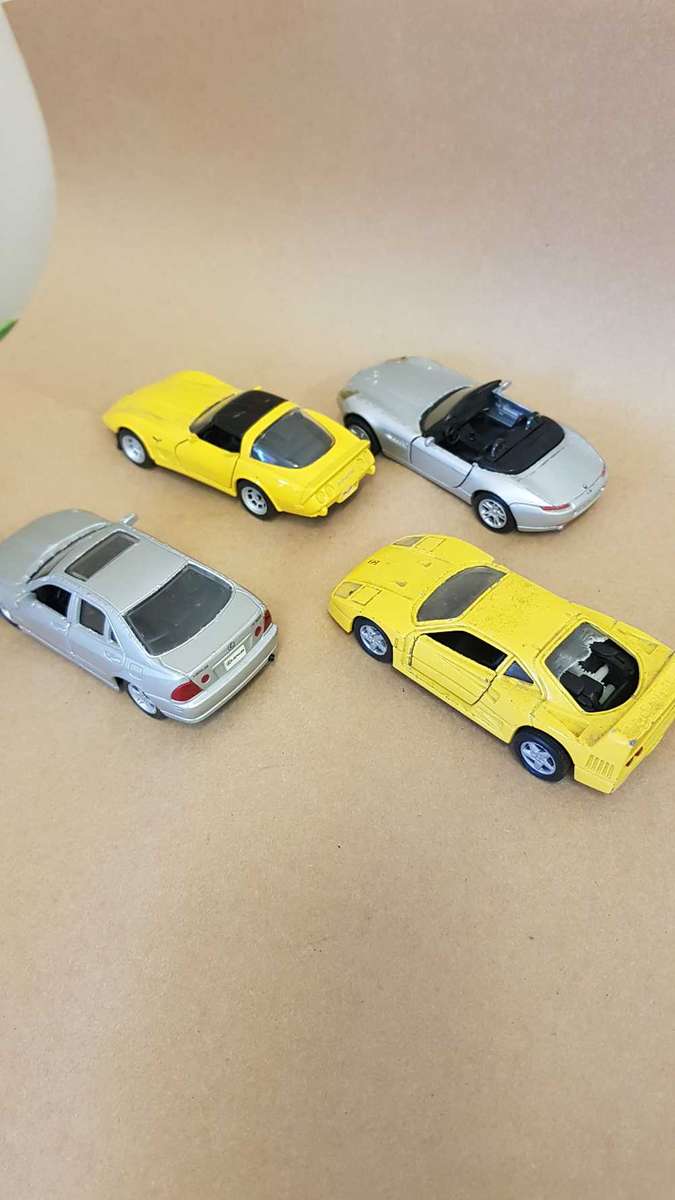 4 scale model Maisto cars. 1/38 scale . Ferrari F40, Corvette, BMW Z8, Lexus IS300