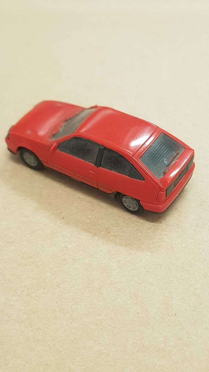 Small model replica of 1986 Opel Kadett Gsi. 45mm as reference.  Made in Germany.  Plastic.