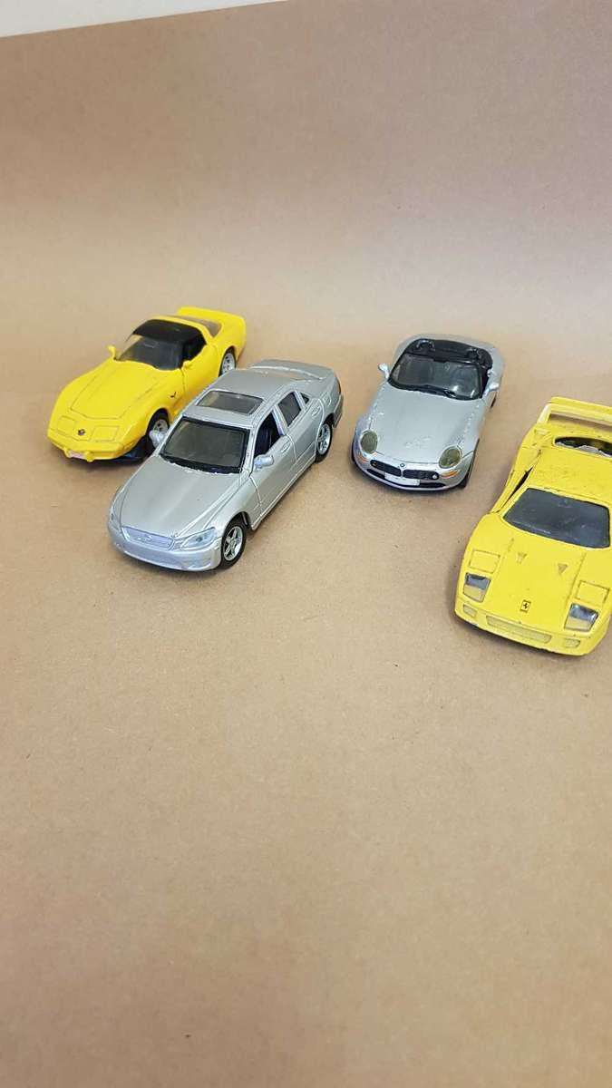 4 scale model Maisto cars. 1/38 scale . Ferrari F40, Corvette, BMW Z8, Lexus IS300