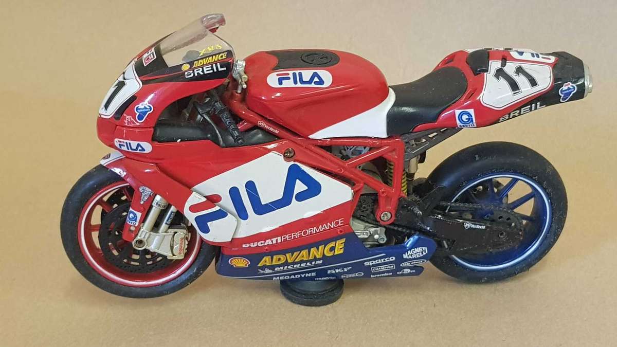 Toy racing motorcycle