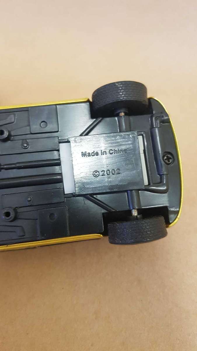 Two Peugeot 307 scale model cars. Dated 2002.