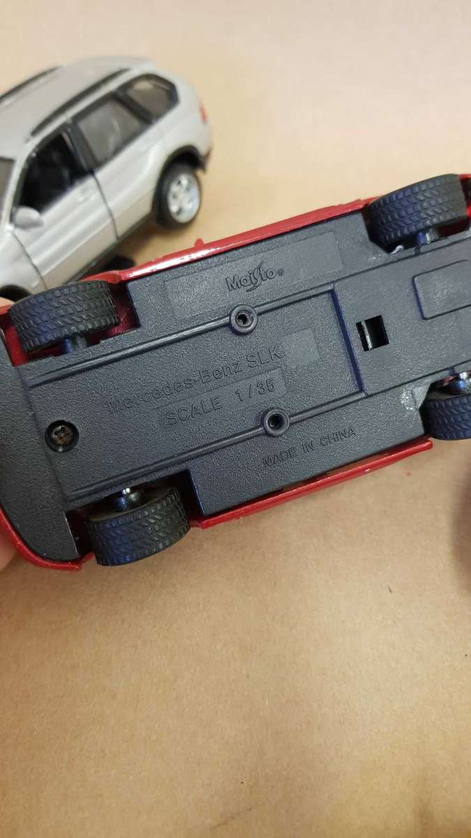 4 Scale model Maisto cars. Renault Clio , Chrysler PT Cruiser ,Mercedes SLK and BMW X5.