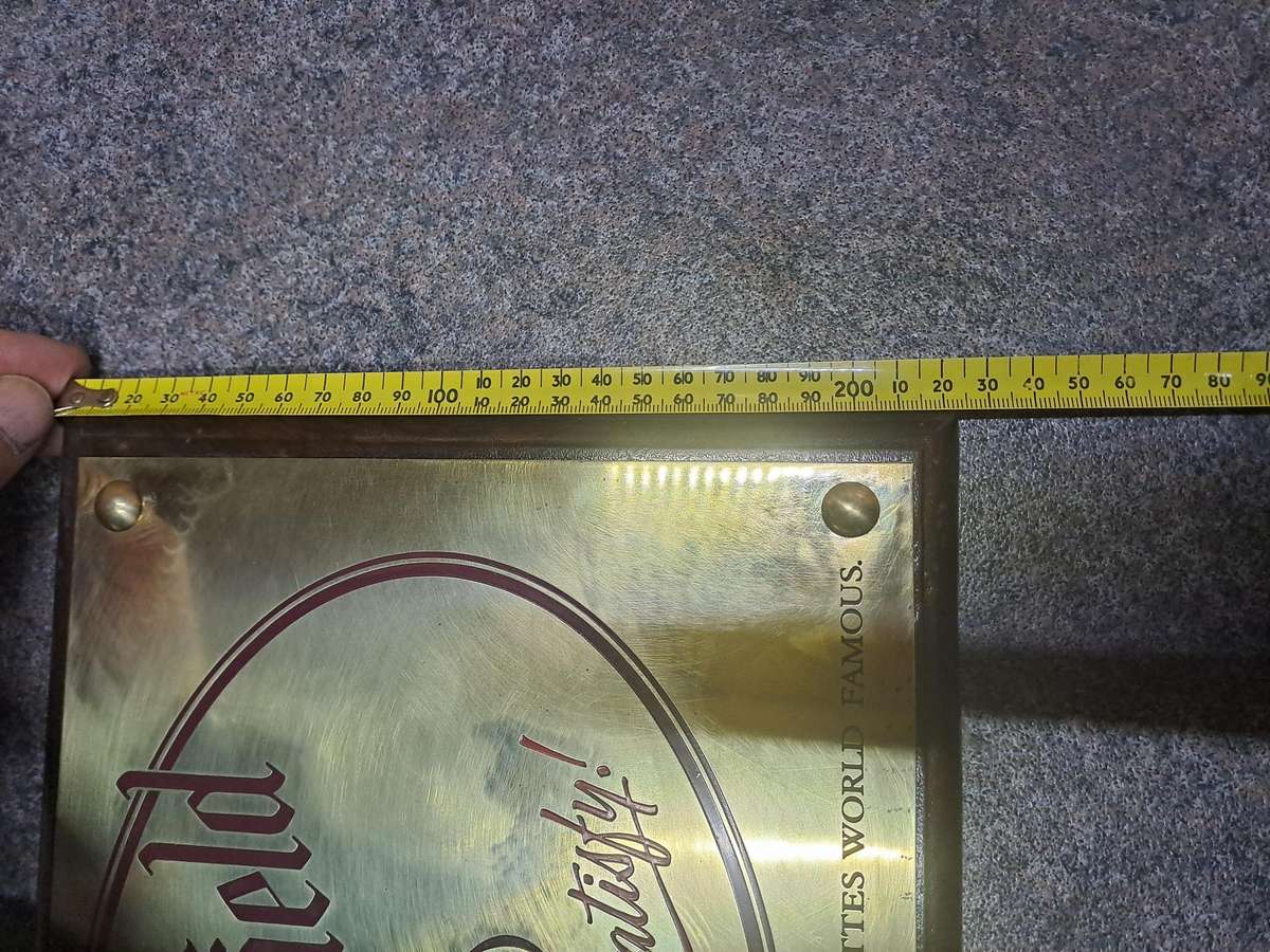 Vintage signage Chesterfield brass and wood advertising