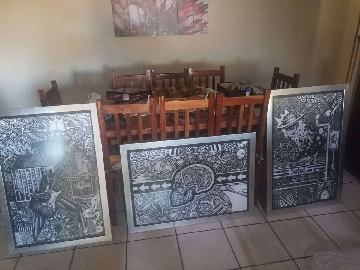 Three framed psychedelic posters for sale