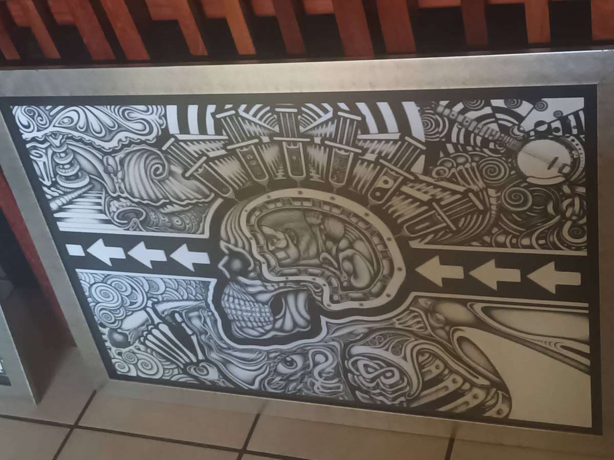 Three framed psychedelic posters for sale