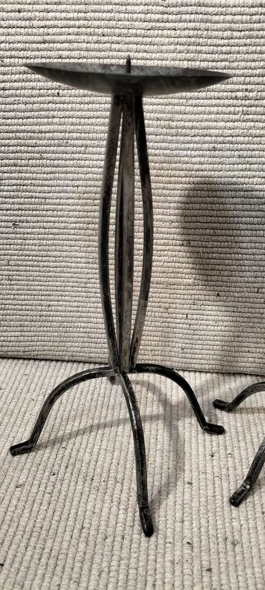 A Superb Pair of Wrought Iron Candle Holders