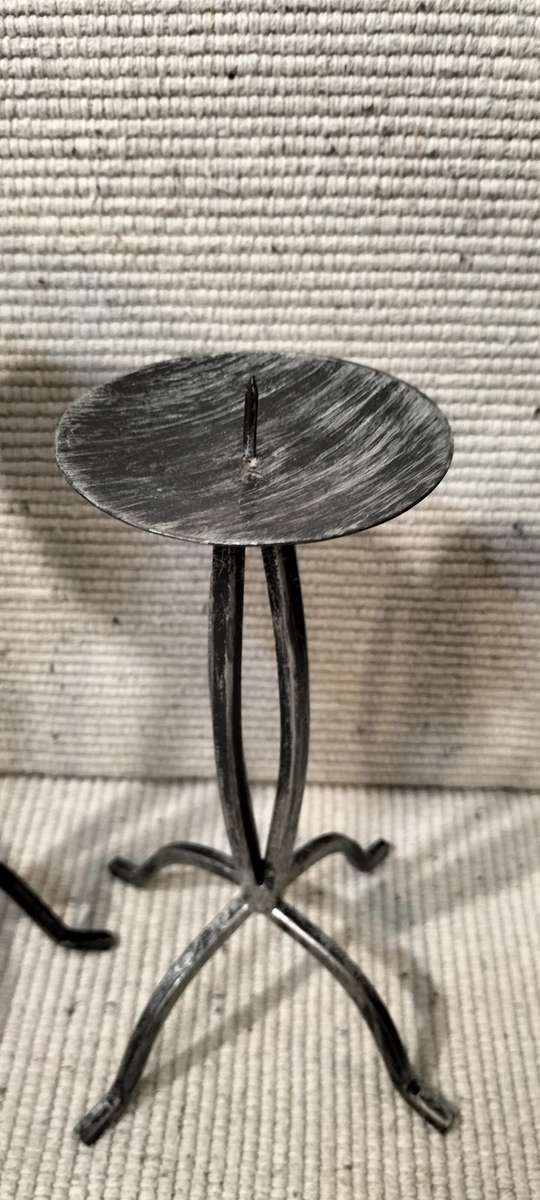 A Superb Pair of Wrought Iron Candle Holders