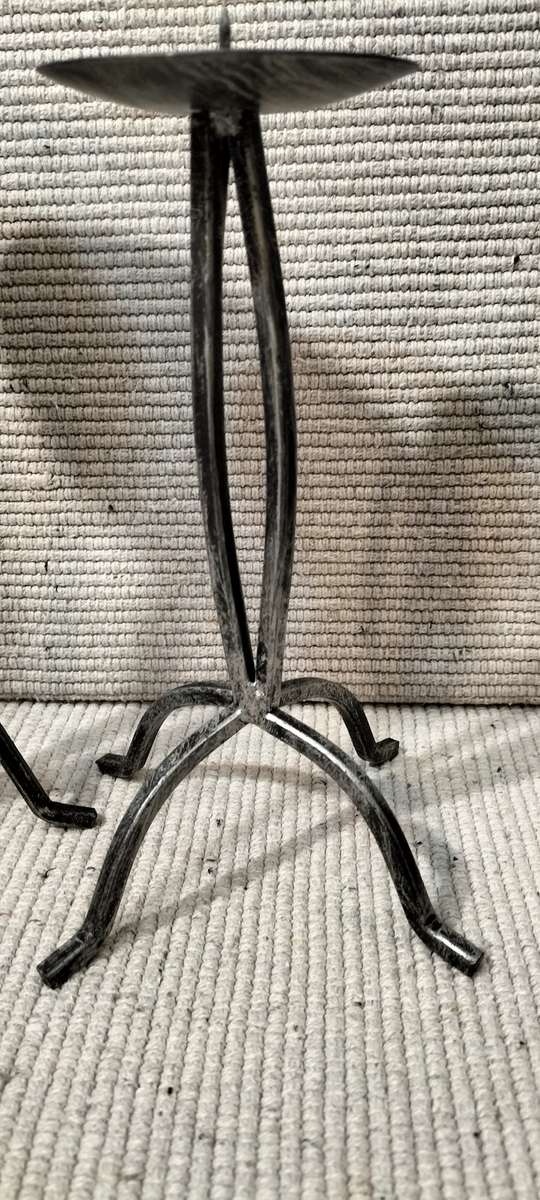 A Superb Pair of Wrought Iron Candle Holders