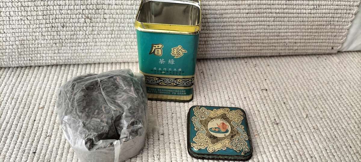 A Vintage Circa 1970 Kwong Sang Chun Mee Green Tea Tin still with Full packet of Tea