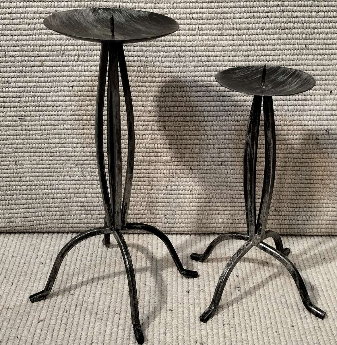 A Superb Pair of Wrought Iron Candle Holders