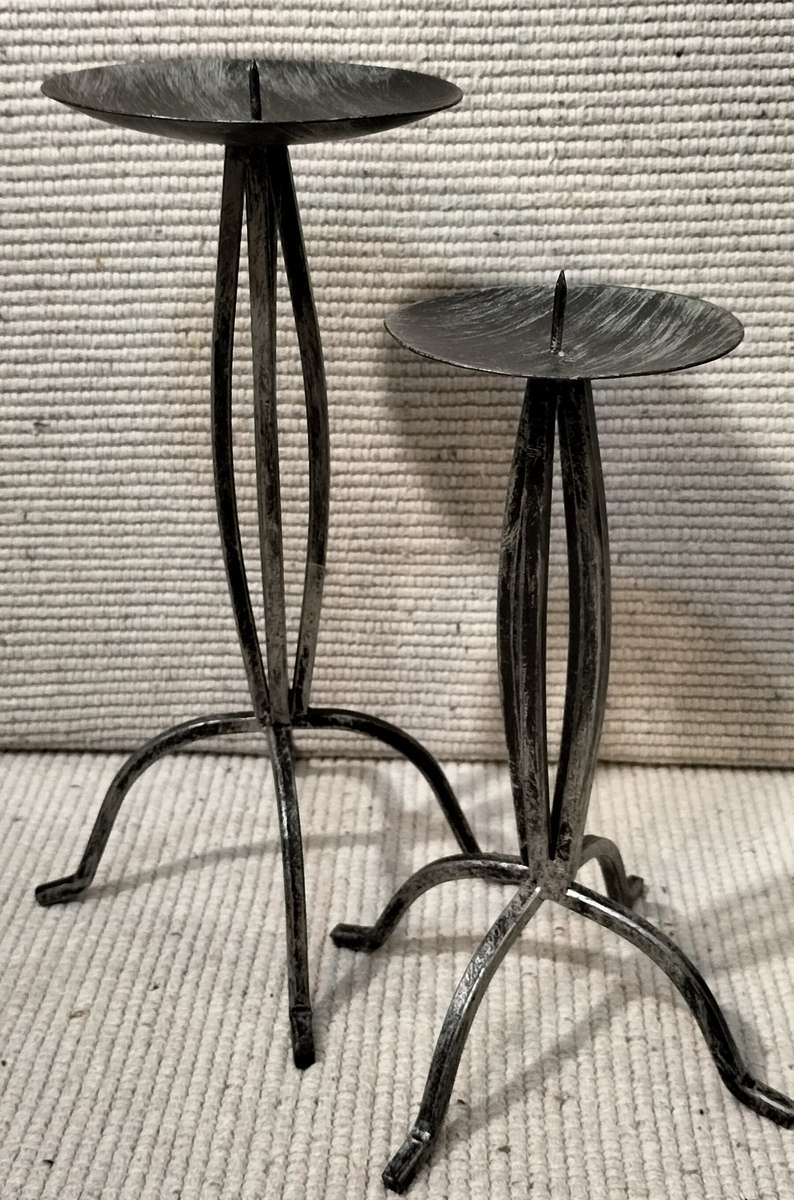 A Superb Pair of Wrought Iron Candle Holders