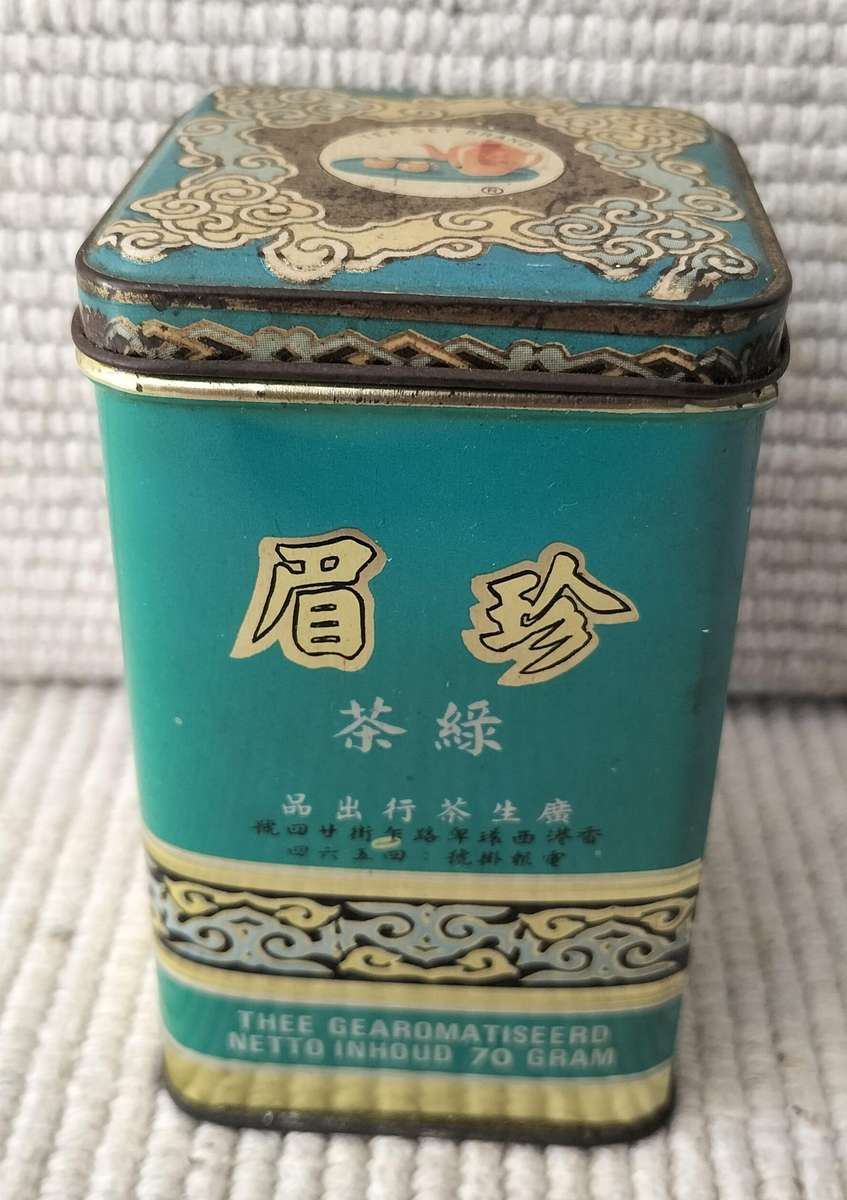 A Vintage Circa 1970 Kwong Sang Chun Mee Green Tea Tin still with Full packet of Tea