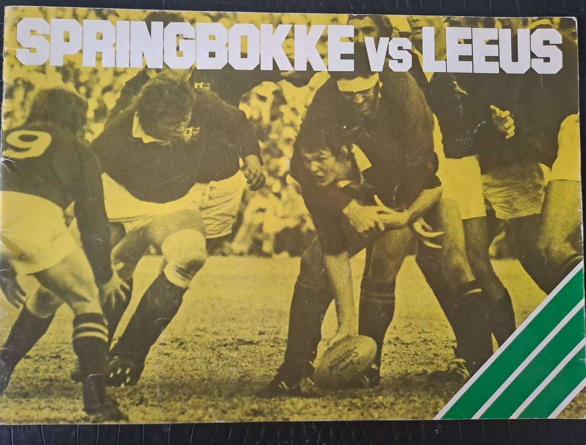Rugby collectors album. 1980 British Lions to SA with 48 pictures pasted down