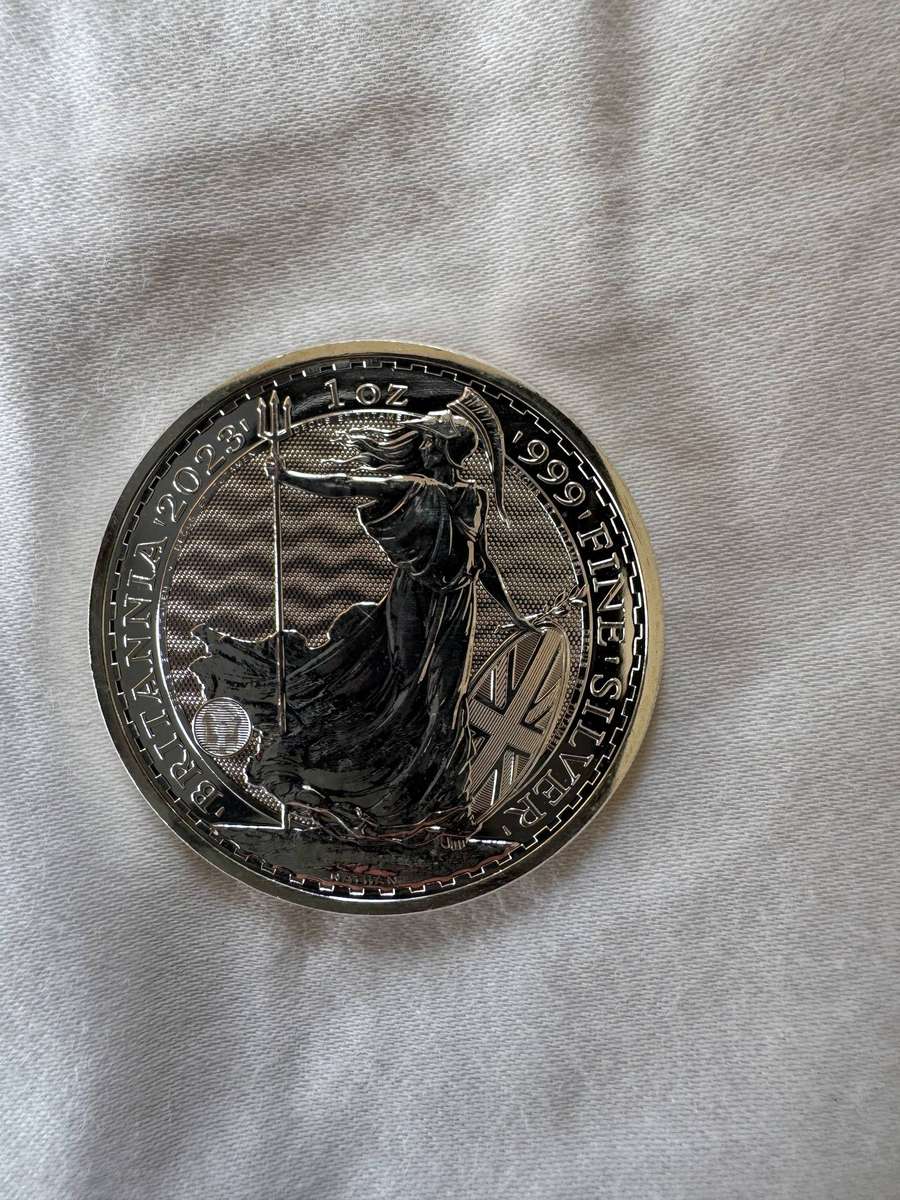 Three UK silver coins and 1 USA silver coin