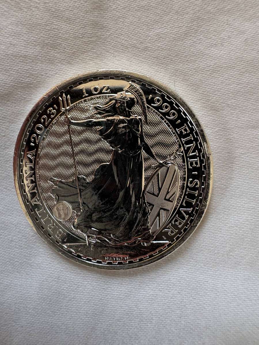 Three UK silver coins and 1 USA silver coin