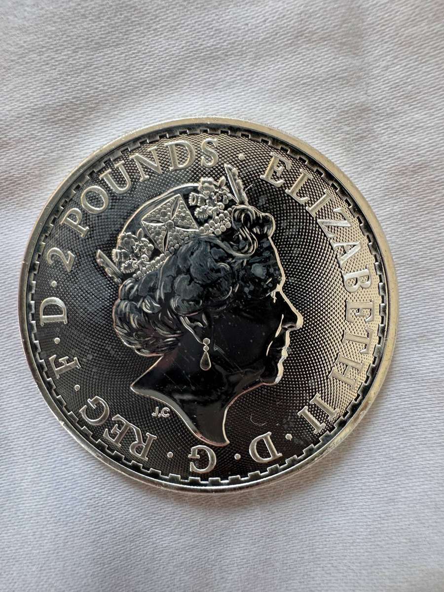 Three UK silver coins and 1 USA silver coin