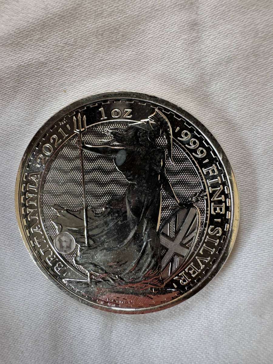 Three UK silver coins and 1 USA silver coin