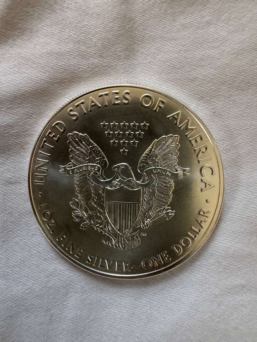 Three UK silver coins and 1 USA silver coin