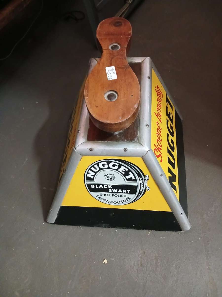 Rare Nugget Shoe Chair plus 2 original Nugget Enamel Signs