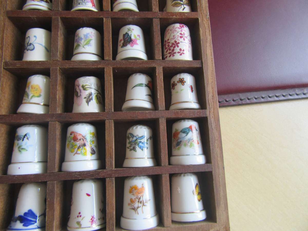 20 BEAUTIFUL PORCELAIN THIMBLESIN SHELF - AS PER SCAN - BID PER ITEM