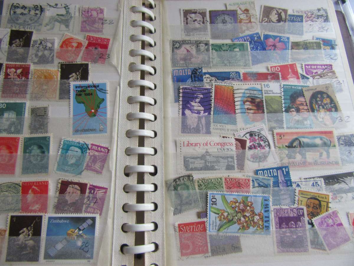 SMALL HUBAG STAMP ALBUM - 10 PAGES FILLED WITH INTERNATIONAL STAMPS - AS PER SCAN - BID PER PAGE
