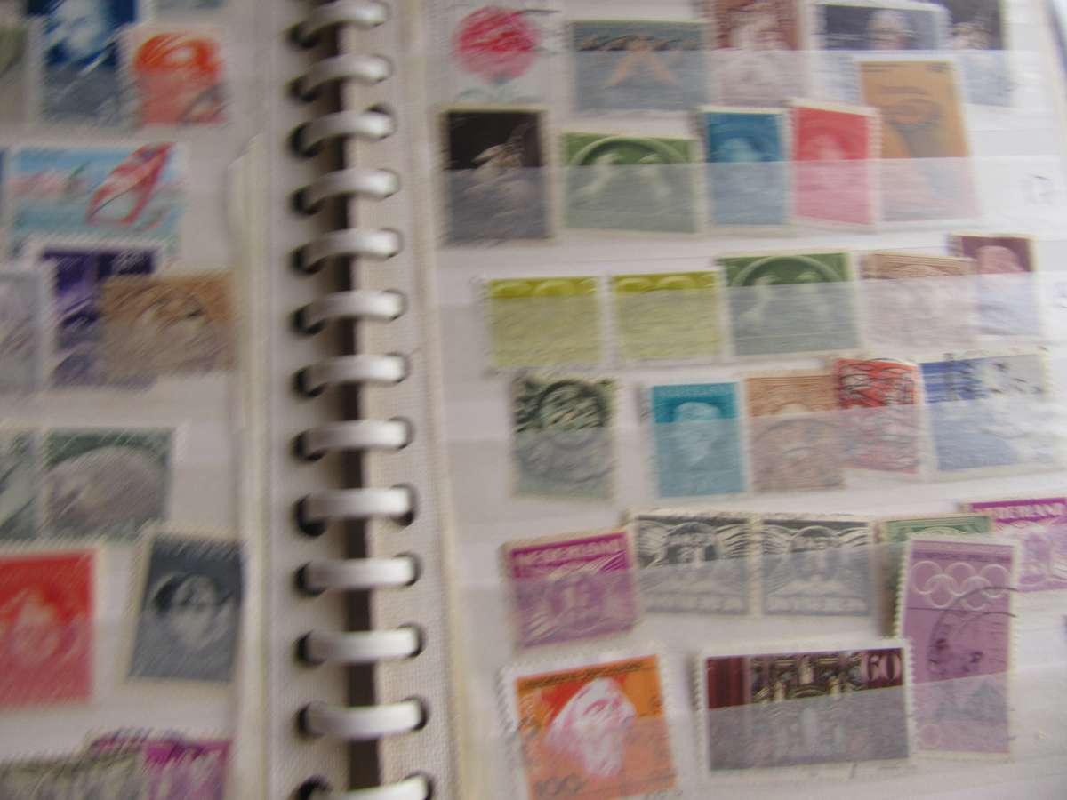SMALL HUBAG STAMP ALBUM - 10 PAGES FILLED WITH INTERNATIONAL STAMPS - AS PER SCAN - BID PER PAGE