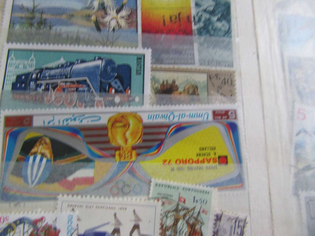 SMALL STAMP ALBUM - 12PAGES FILLED WITH INTERNATIONAL STAMPS - AS PERSCAN- MD
