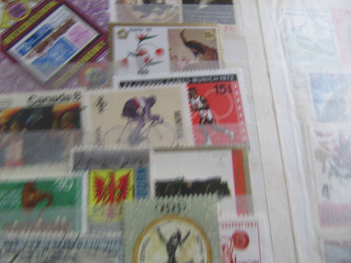 SMALL STAMP ALBUM - 12PAGES FILLED WITH INTERNATIONAL STAMPS - AS PERSCAN- MD