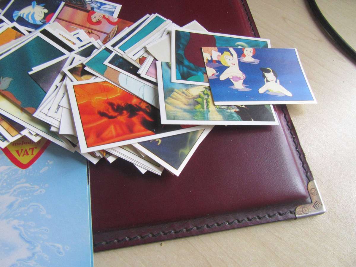 EMPTY MERMAID FOLDER WITH OVER 300 LOSE STICKERS- AS PER SCAN