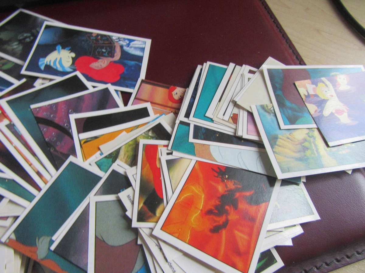 EMPTY MERMAID FOLDER WITH OVER 300 LOSE STICKERS- AS PER SCAN