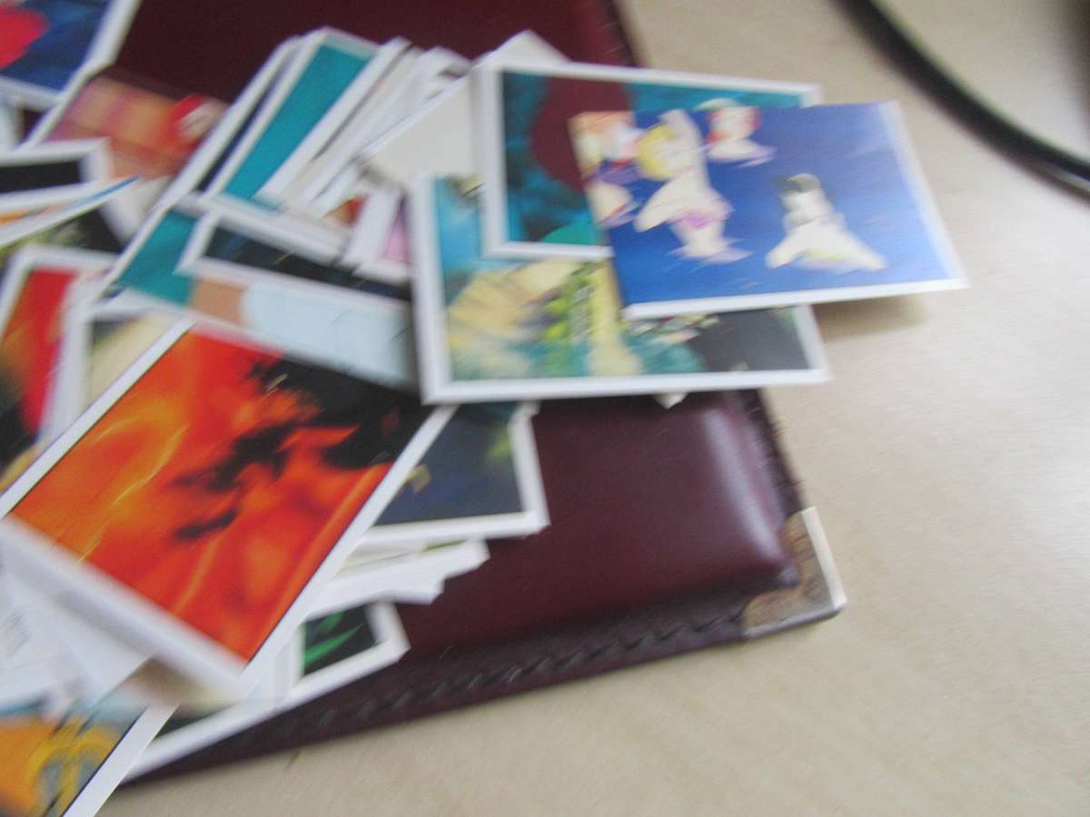 EMPTY MERMAID FOLDER WITH OVER 300 LOSE STICKERS- AS PER SCAN