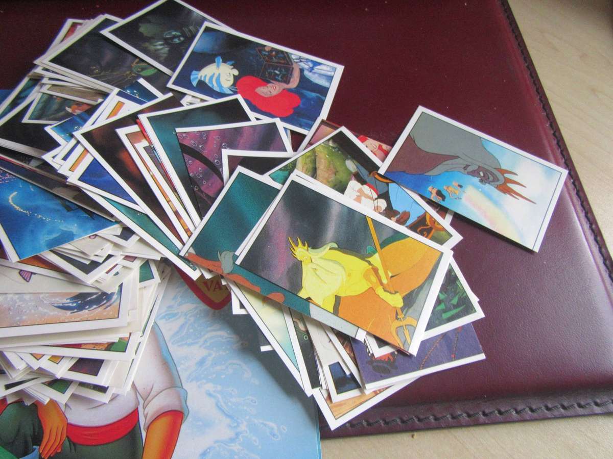 EMPTY MERMAID FOLDER WITH OVER 300 LOSE STICKERS- AS PER SCAN