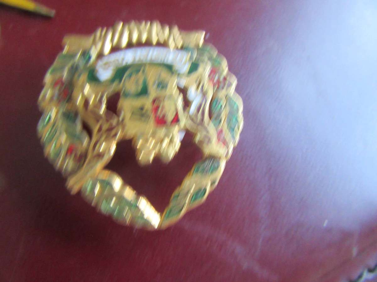 Collection of 15 enamel lapel pins/badges
