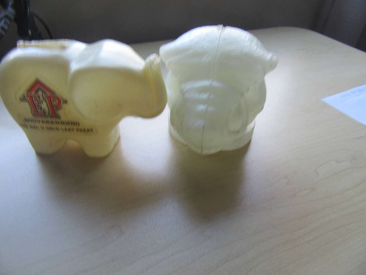 TWO VINTAGE MONEY SAVING BOXES - AS PER SCAN - BID PER ITEM