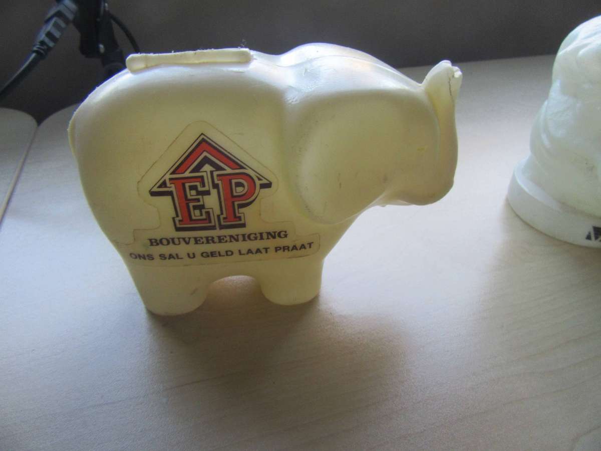 TWO VINTAGE MONEY SAVING BOXES - AS PER SCAN - BID PER ITEM