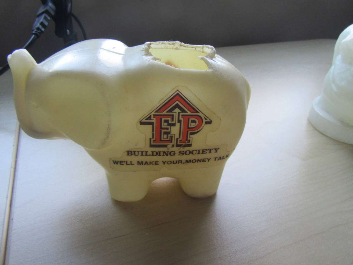 TWO VINTAGE MONEY SAVING BOXES - AS PER SCAN - BID PER ITEM