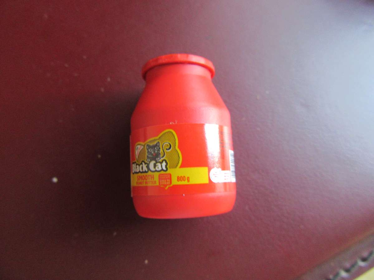 CHECKER'S LITTLE SHOP GOES EXTRA - BLACK CAT