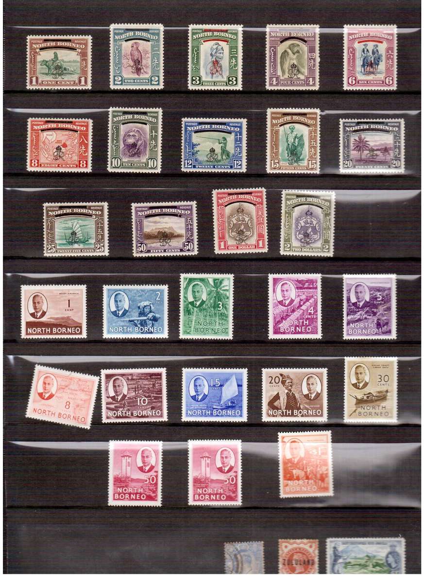 Stamps on Pages - NZ, Newfoundland, Nigeria, North Borneo, etc - See Description