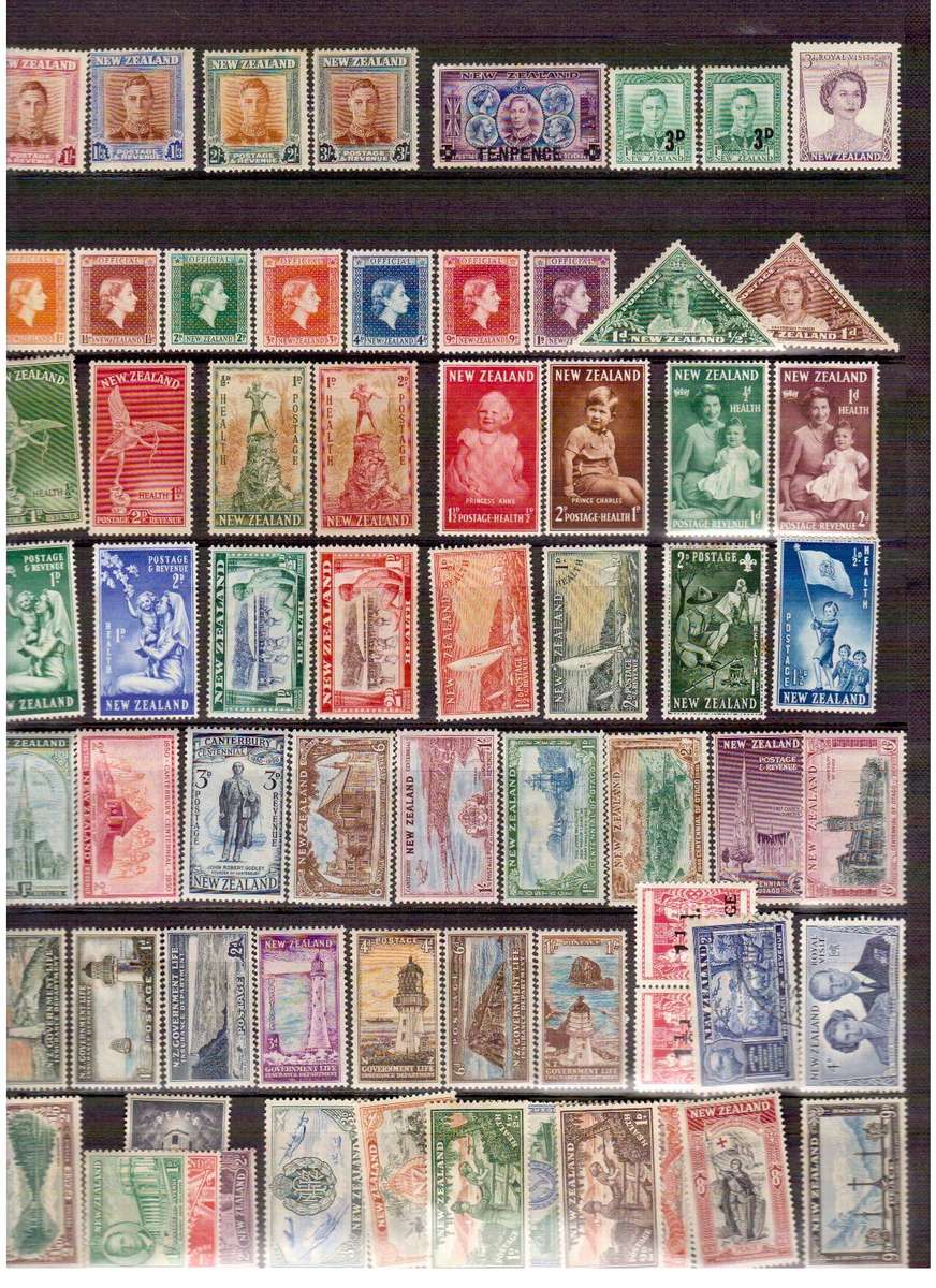 Stamps on Pages - NZ, Newfoundland, Nigeria, North Borneo, etc - See Description