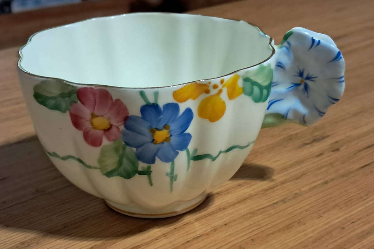 Hand painted Paragon tea trios and plate